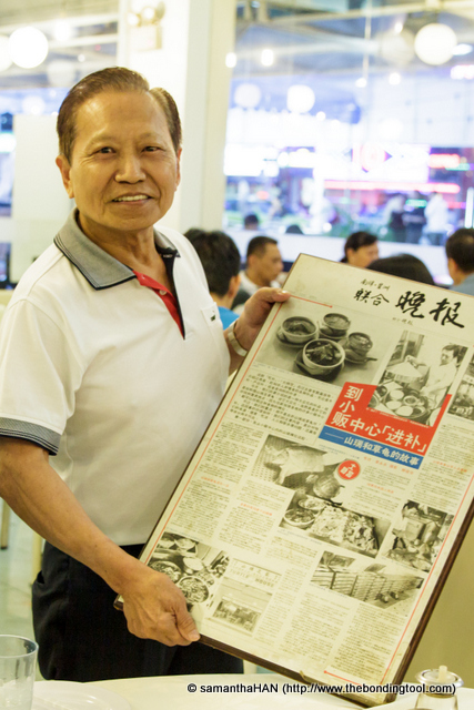 Mr. Ong Siong Lim showing us some newspapers' report of his culinary achievement stories.